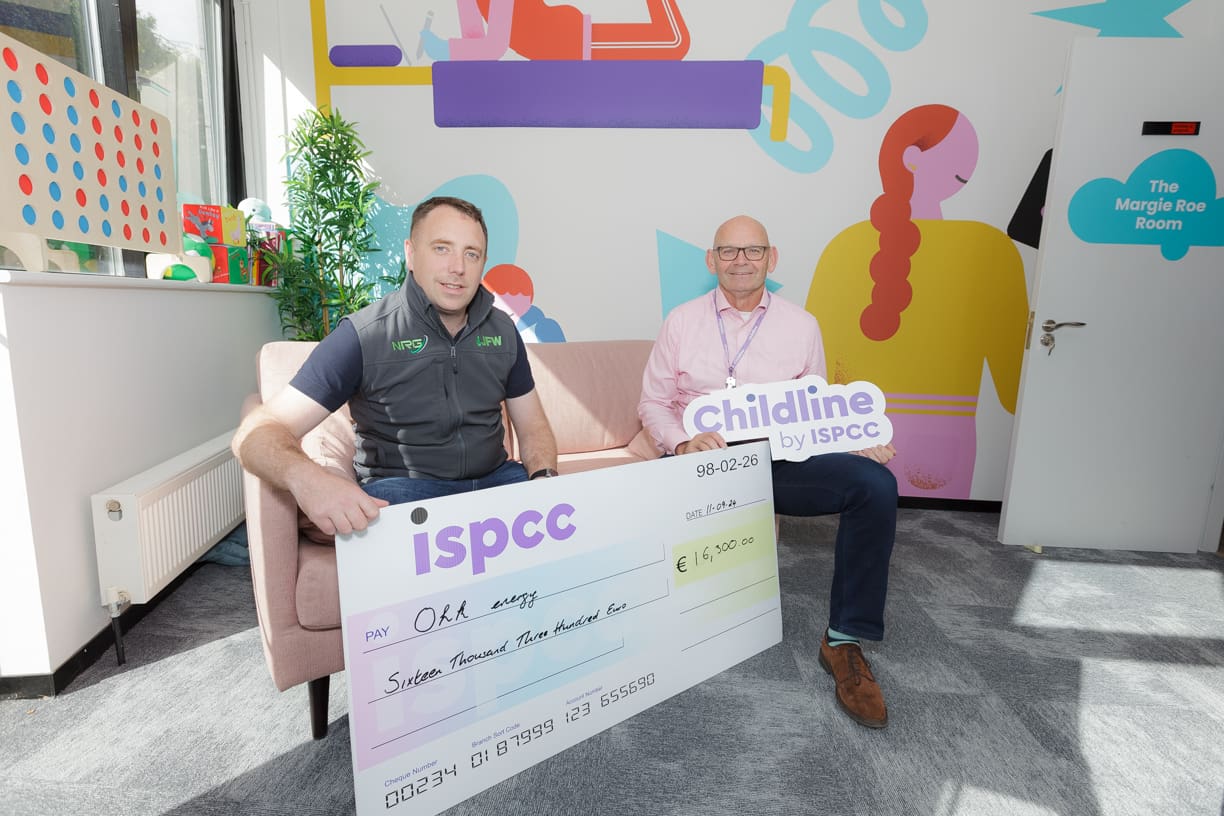 ohk energy presenting cheque to ISPCC CEO John Church