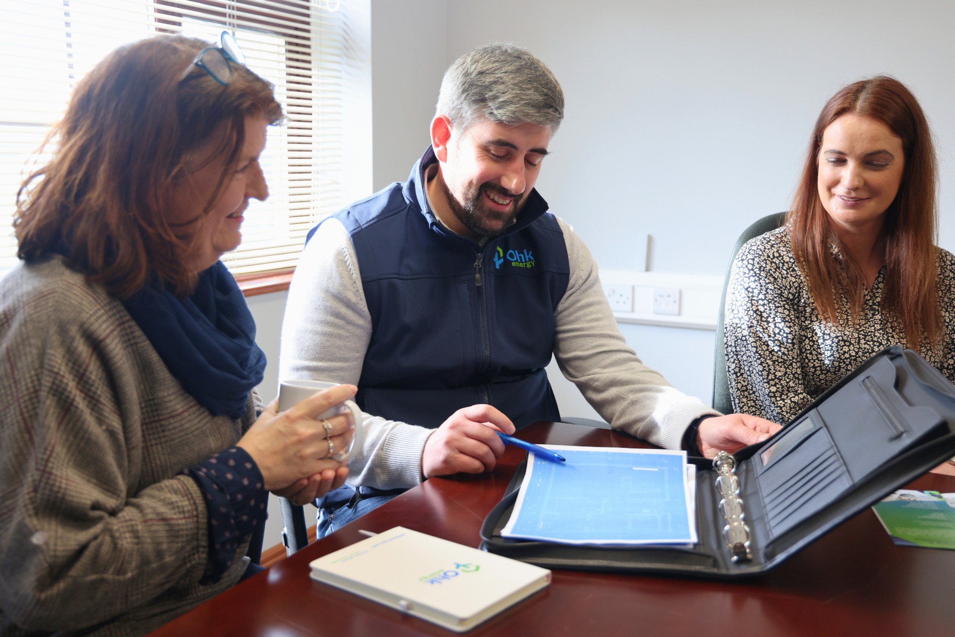 Image of an Ohk energy employee explaining what a BER rating is and why it matters.