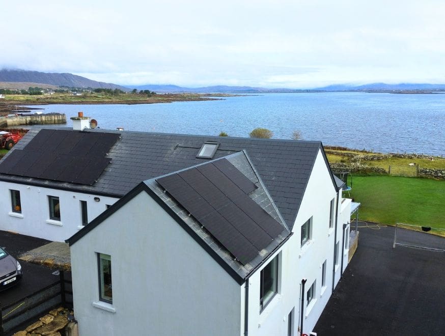 18 solar panels installed on a roof.