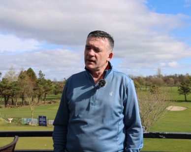 Golf Club Solar Panel Installation Video Preview Image showing Loughrea Golf Club representative, Adrian Callanan, in foreground with golf course behind.