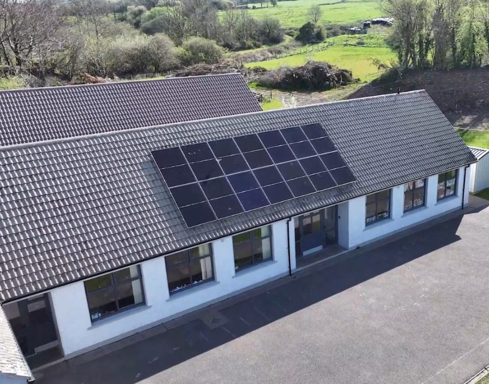 School Solar Panel Installation Image showing 14 solar panels installed by Ohk energy on a school roof.