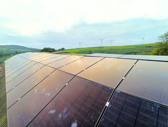 Farm building roof-top solar installation.