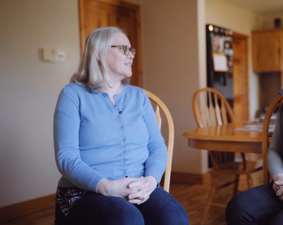 Solar Panels Installation Louth Video Preview showing an Ohk energy solar PV customer sitting on a chair speaking to us.