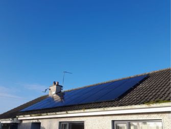 16 solar panels installed on a roof - solar panels cork