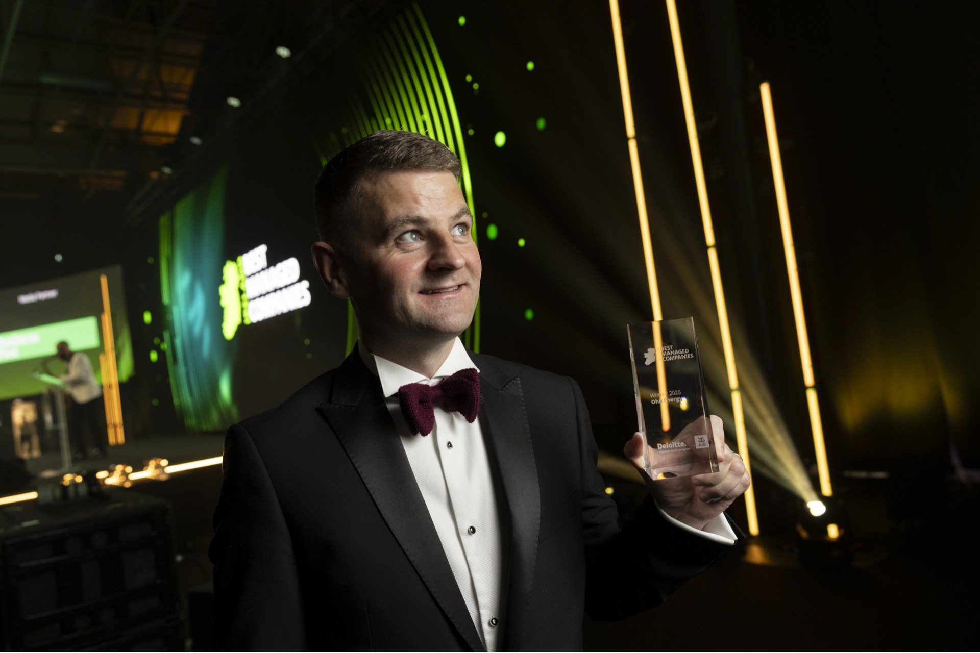 Best Managed Company Award Winner Image showing Ohk energy representative holding the award.