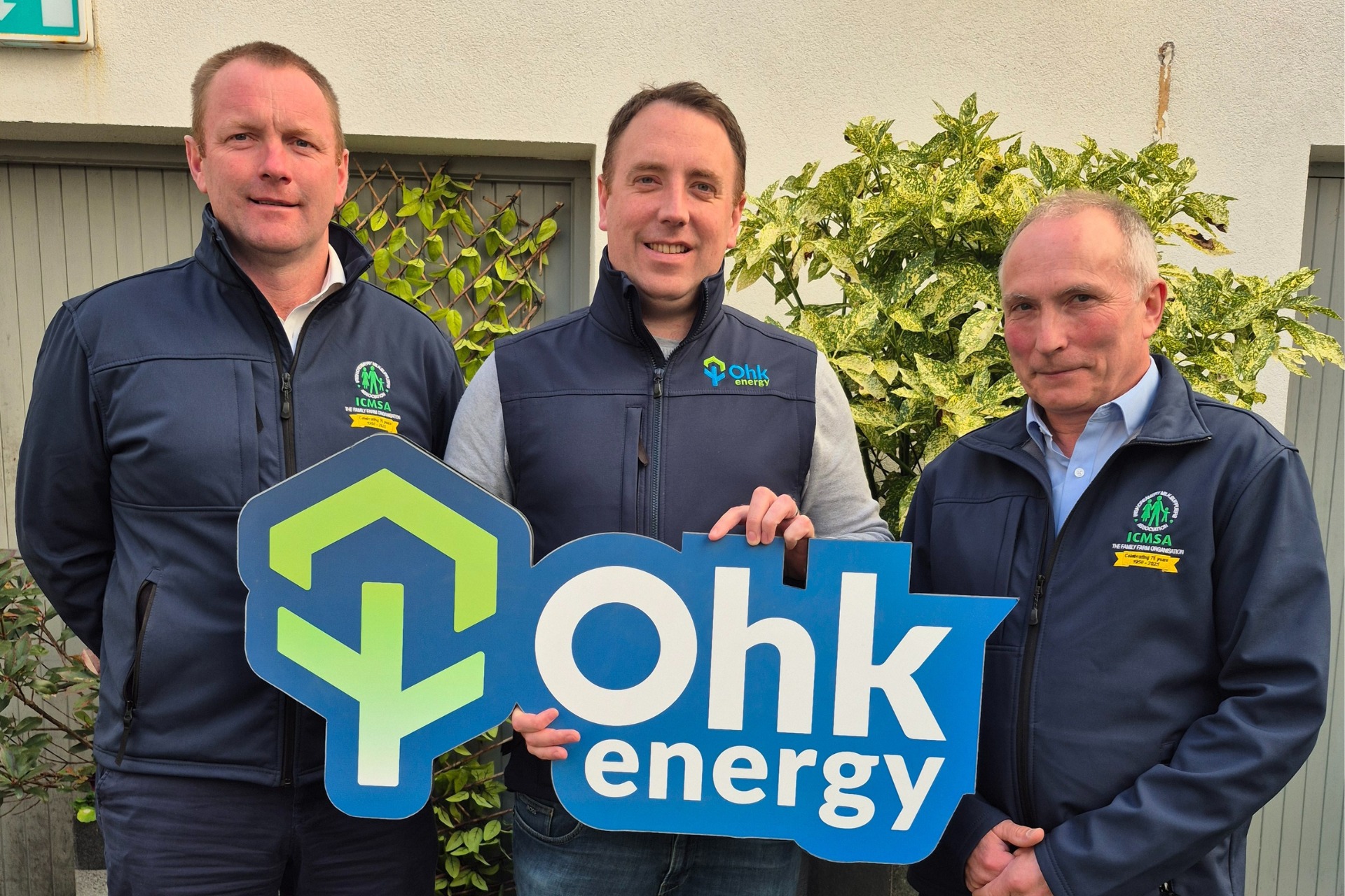 Ohk energy & ICMSA partnership announcement image showing Ohk energy and Irish Creamery Milk Suppliers Association representatives pictured together.