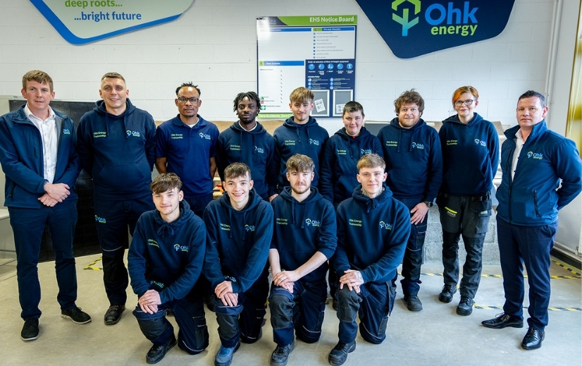 Ohk energy and CMETB Renewable Construction Technologies Traineeship Image showing the latest students pictured with Ohk energy senior management in a classroom.