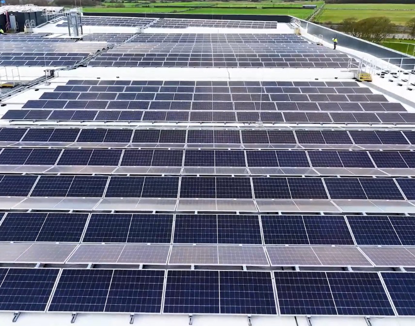Energy Resilience With Commercial Solar Panels Image showing thousands of solar panels installed on a commercial building in Ireland by Ohk energy.